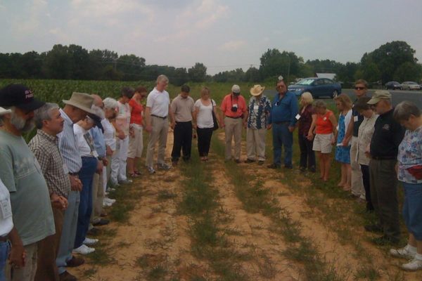 NFWM Board, Staff & Supporters hold a service honoring farm workers who work in tobacco fields, 2009.