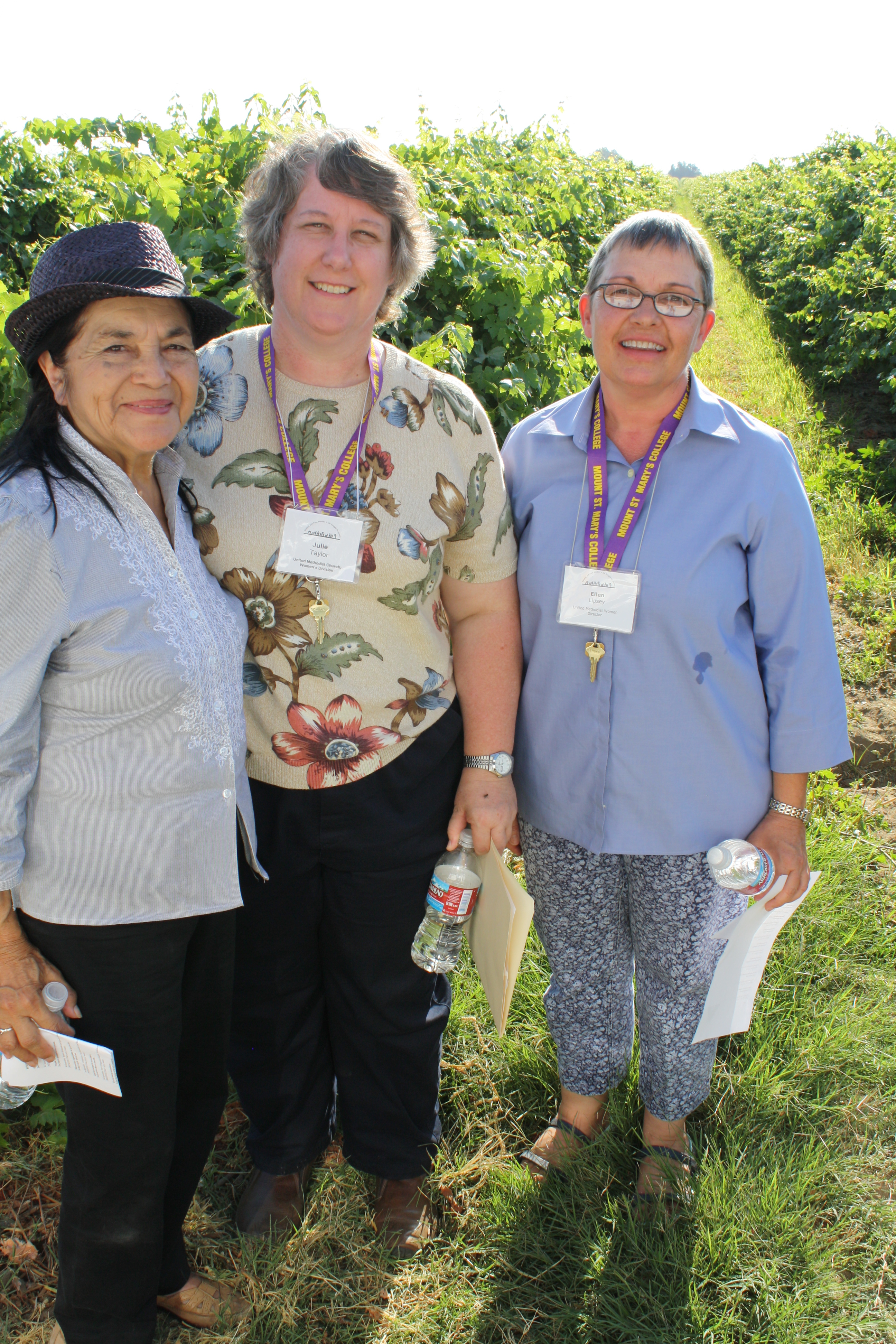 Julie Taylor with Dolores Huerta and Ellen Lipsey, of United Methodist Women at a grape field in California. 