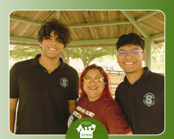 Elizabeth Rodriguez with high school filmmakers Esteban Reyes and Daniel Maldonado in Homestead, Florida, as they interview NFWM for their documentary on equality and opportunity for farm workers.